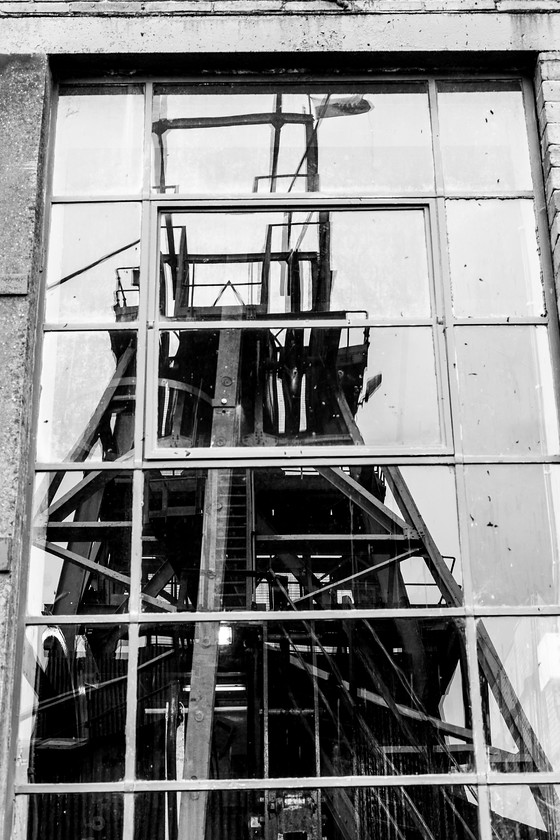 Pit head gear 
 Keywords: Big BPit, glass, pithead, reflection, winding gear, window