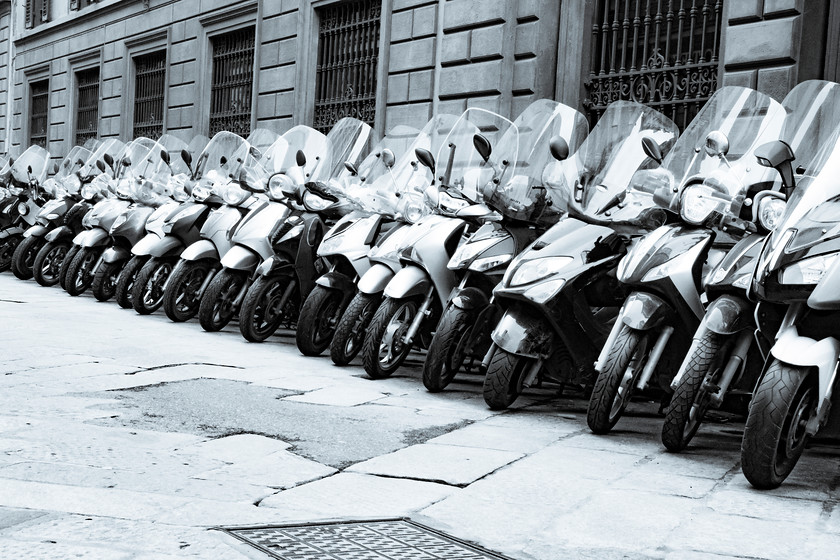 Scooters in a row 
 Keywords: Firenze, Florence, motor bikes, scooters