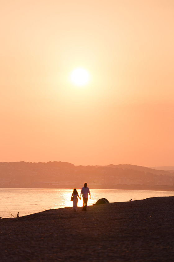 Seaford Beach sunset 
 Keywords: Beach, Seaford, couple, hand in hand, stroll, sunset